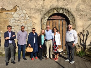 Rotary partners standing outside the entrance to the San Esteban del Mar chapel